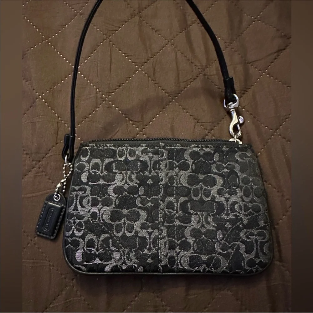 Coach Monogram Wristlet in Black silver with Metallic Elements and leather strap